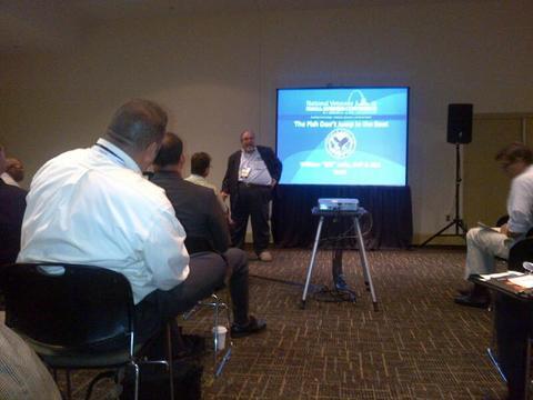Photo of Bill Jaffe presenting about federal procurement at the National Veterans Small Business Conference August 2013